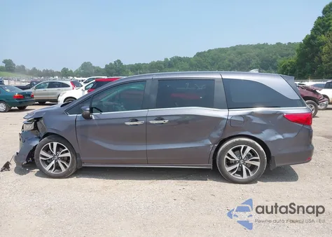 2022 Honda Odyssey Touring z USA, uszkodzony, nr VIN 5FNRL6H83NB023583